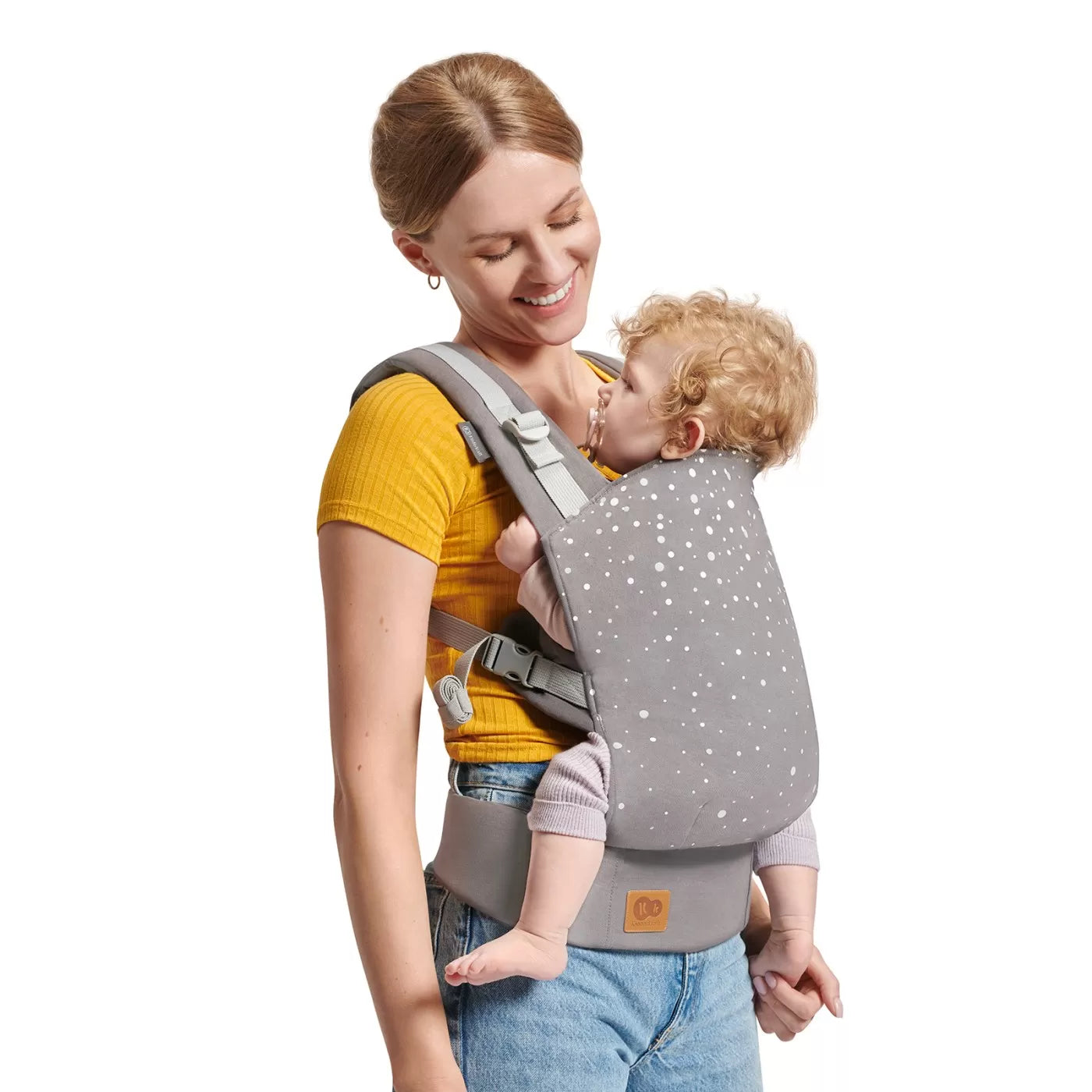 Kinderkraft Nino ergonomikus babahordozó, 20 kg-ig, konfetti szürke